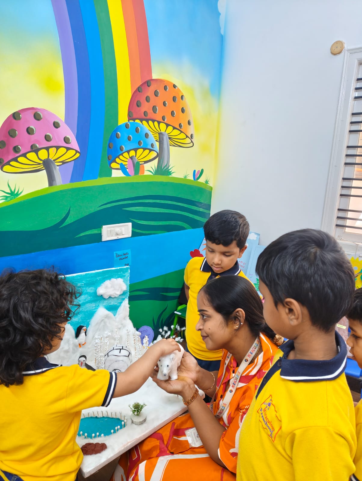 Children playing happily at Miraculous Preschool